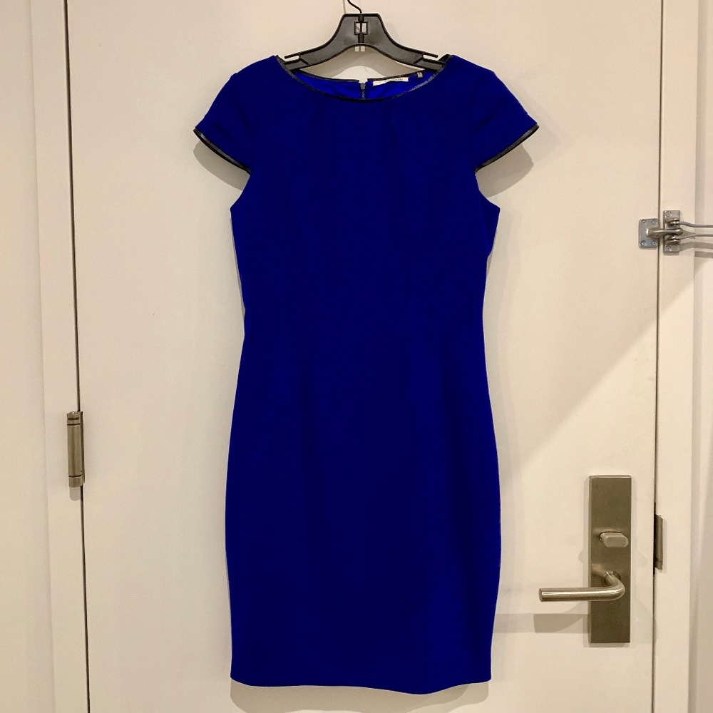 T Tahiri like new dress w black faux leather trim